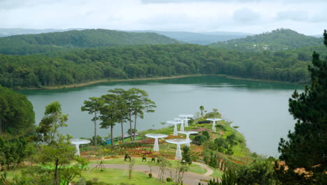 Aerial-view-on-Lavenderdalat-Park-by-Tuyen-Lam-Lake-And-Surrounding-Wild-Pine-Forest---zoom-in