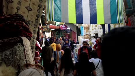 Crowded-Medina,-city-market-for-shoppers-and-popular-tourists-attraction-SLOW-MOTION