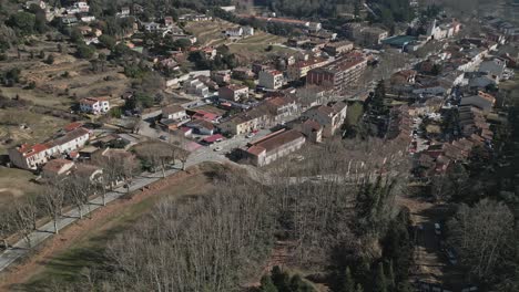 Stunning-aerial-view-of-Vallgorguina,-a-village-in-Barcelona,-Spain