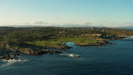 A-breathtaking-push-drone-shot-captures-the-lush-green-landscapes-of-Connemara,-Galway,-Ireland