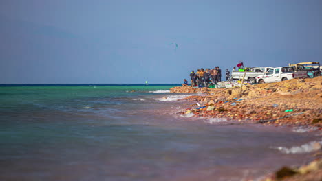 Low-Angle-Time-Lapse-of-People-Along-the-Coastal-Area-of-Dahab-in-Egypt