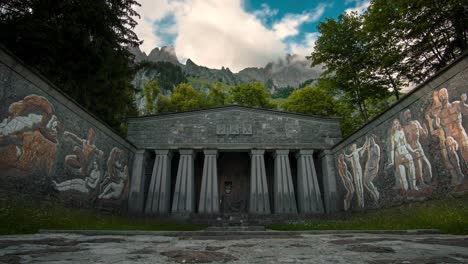 Time-lapse-in-front-of-the-peace-monument-Paxmal-with-the-imposing-Churfirsten-mountain-range-in-the-background