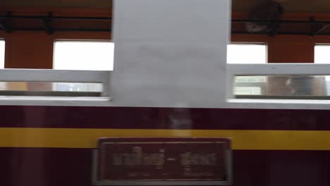 Close-up-of-local-train-leaving-from-Thungsong-Junction-railway-station