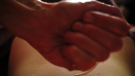 hand-massage-using-massage-oil