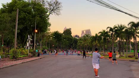 Thai-people-doing-group-gymnastic-exercise-weight-loss-in-Lumpini-Park