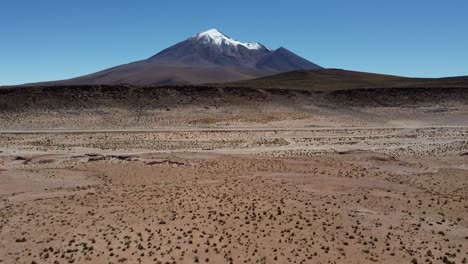 Snow-capped-mountain-peak-in-Bolivia-seen-from-high-desert-altiplano