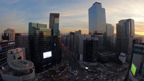 SunsetGangnam-District-SKyline-at-Sunset,-Time-Lapse-Over-Seoul-City-Downtown-Skyscrapers-and-Cars-Traffic-at-Twillight---High-Angle-View-From-Rooftop