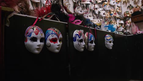 Colorful-Venetian-masks-at-Ca'-Macana,-Italy