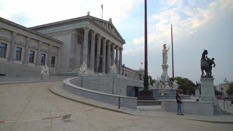 Woman-Possing-Near-Entrance-to-Austrian-Parliament