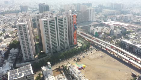 Rajkot-aerial-drone-view-Large-buildings-around-and-a-large-field-in-front-are-also-visible