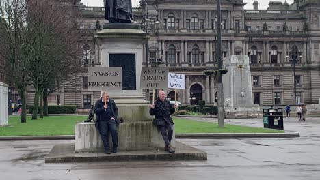 Two-old-guys-protesting-against-an-Anti-racism-march-in-George-Square