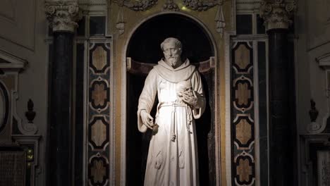 Marble-Statue-of-Holy-Saint-inside-peaceful-baroque-Catholic-Church-of-Gesu-Nuovo,