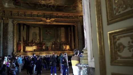 Revealing-L'appartement-de-la-Dauphine-with-paintings,-golden-ornaments-and-marble-walls-get-explored-of-many-tourists-at-famous-Castle-Versailles-in-Paris-France