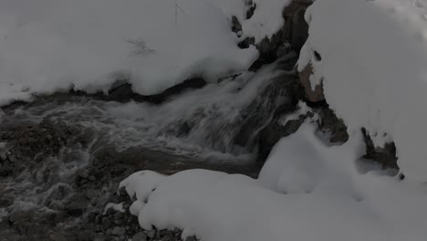 Stunning-Livigno-Alps-drone-video:-snow-peaks,-city-and-mountain-town,-ideal-for-high-quality-winter-and-tourism-ads