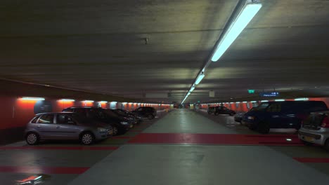 Car,-bus-and-vehicles-parked-in-line-in-an-undeground-parking-space