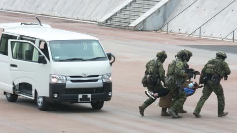 Police-officers-perform-a-staged-counter-terrorism-drill-during-an-open-day-to-celebrate-the-National-Security-Education-Day-at-the-Hong-Kong-Police-College-in-Hong-Kong,-China