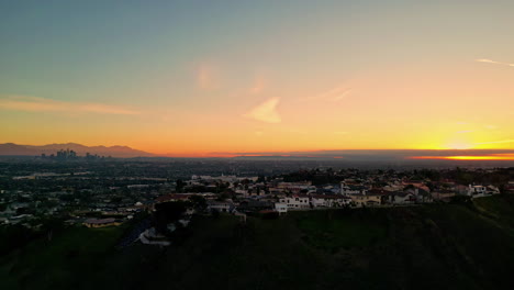 Aerial-drone-view-of-a-warm-sunset-in-Kenneth-Hahn-viewpoint-California