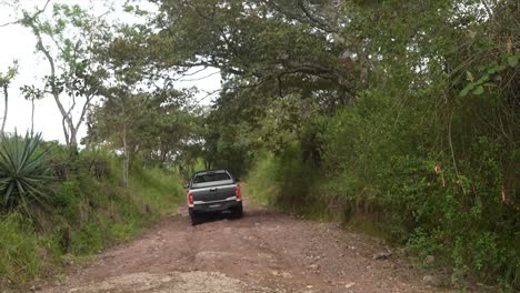 f4WD-car,-oton-4x4-car-on-dirt-road-in-the-mountains,-motor