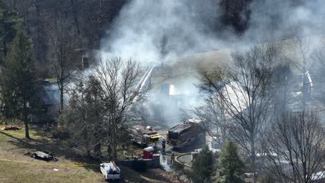 Thick-smoke-rising-into-sky-during-house-fire