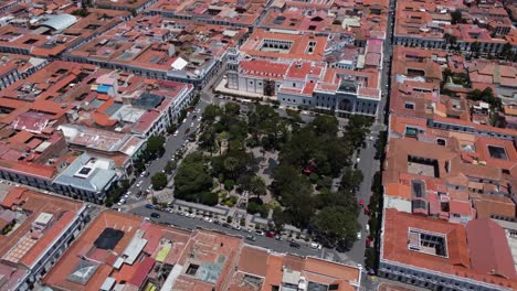 Aerial-orbits-beautiful-public-square,-May-25-Plaza-in-Sucre,-Bolivia