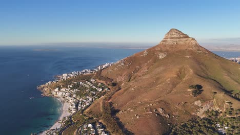 Aerial-drone-of-Clifton-Beach-and-Lions-Head-Mountain-in-Cape-Town,-South-Africa,-near-Camps-Bay