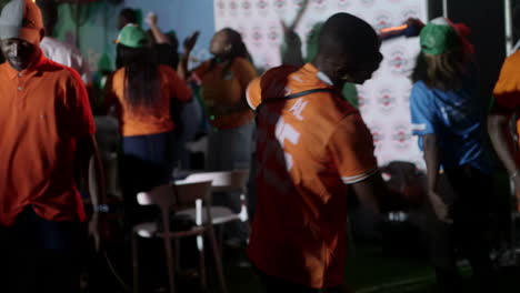 Ivorian-Man-Dancing-In-A-Fan-Zone-After-Ivory-Coast-Win,-Africa-Cup-of-Nations-2023,-Abidjan