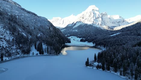 Obersee-Glarus-Switzerland-reverse-flight-to-reveal-winter-lake