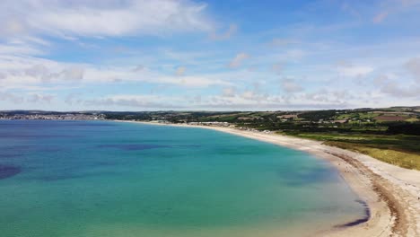 Aerial-panning-right-shot-of-the-coastline-at-Penzance-Cornwall-England