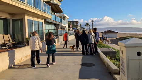 Walking-Along-Manhattan-Promenade-During-Warm-Sunset-with-People-Enjoying-the-Route