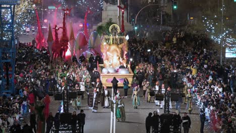 King-Balthazar-and-parade-floats-greet-children-and-families-at-the-Three-Wise-Men-festival,-also-known-as-the-Three-Kings-Parade