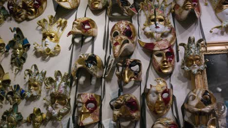 Luxurious-golden-Venetian-masks,-Ca-'Macana,-Venice,-Italy