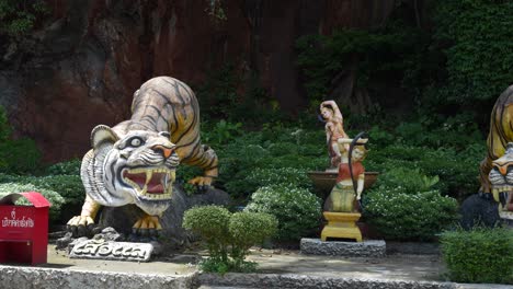 Sacred-tiger-statue-at-Wat-Tham-Suea-Temple,-Tiger-Cave-Temple,-Krabi,-Thailand