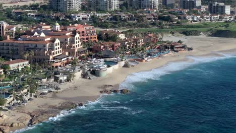 Hacienda-del-mar-Los-Cabos-resort-with-turquoise-sea-and-sandy-beach,-aerial-view