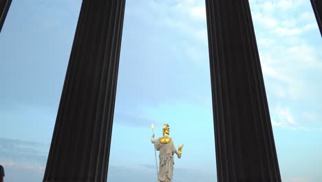 Zoom-In-on-Sky-Through-Colonnade-of-Austrian-Parliament-Entrance