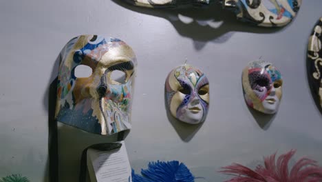 Artistic-Venetian-mask-with-Venice-painting,-Italy