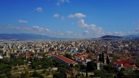 Ciudad-De-Atenas-Desde-Una-Vista-Aérea-De-Drones-Cerca-Del-Monumento-A-La-Acrópolis,-Grecia