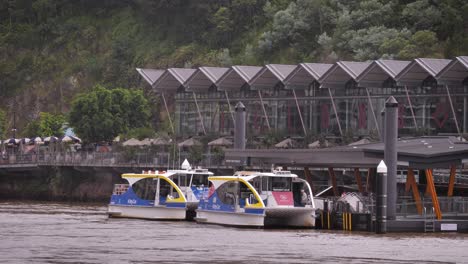 Two-small-ferry's-waiting-at-Howard-Smith-Wharves-viewed-from-New-Farm-River-Walk