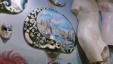 Venetian-cityscape-painted-mask,-Ca'-Macana-artistry,-Venice-Italy