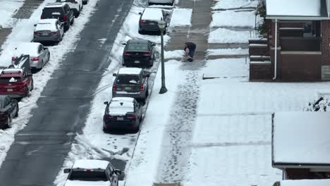 People-shoveling-a-sidewalk