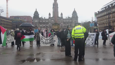 Wide-of-a-pro-Palestine-counter-protest-in-a-rainy-Glasgow