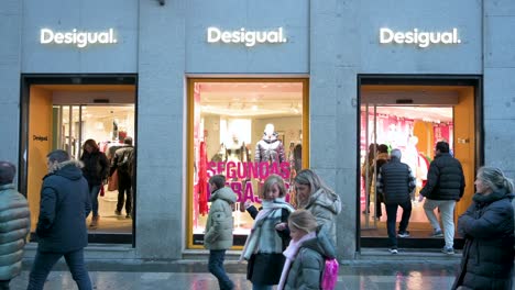 Shoppers-are-seen-entering-the-Desigual-store,-a-Spanish-clothing-brand,-in-Madrid,-Spain