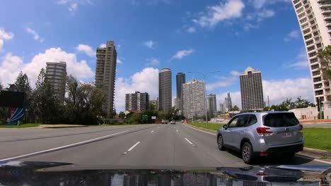 POV-driving-through-Surfers-Paradise,-Gold-Coast