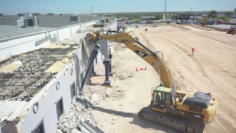 Building-demolition-using-an-excavator