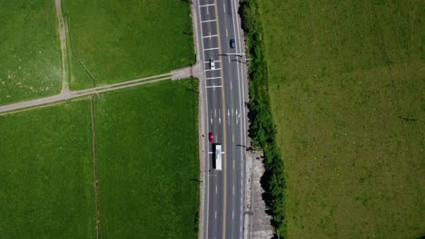 Drop-down-aerial-view-traffic-South-Pan-American-Highway-E35,-Ecuador