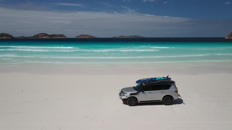 Nissan-Patrol-Y62-driving-on-the-beach-at-Lucky-Bay-WA