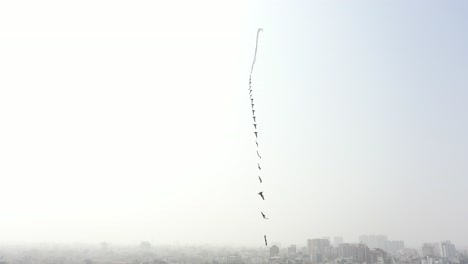 Rajkot-kite-festival-aerial-drone-view-Drone-camera-moving-with-big-kites-flying-different-types