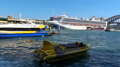 Sydney-Harbour-with-jet-boat,-ferries,-and-cruise-ship,-sunny-day