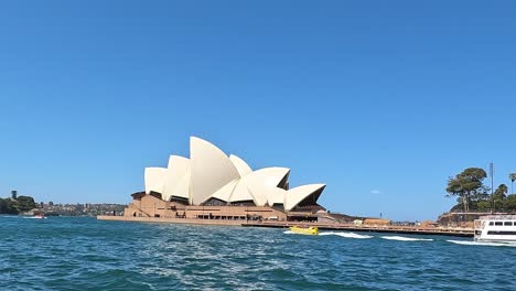 Sydney-Opera-House-iconic-performing-arts-center,-viewed-from-the-sea