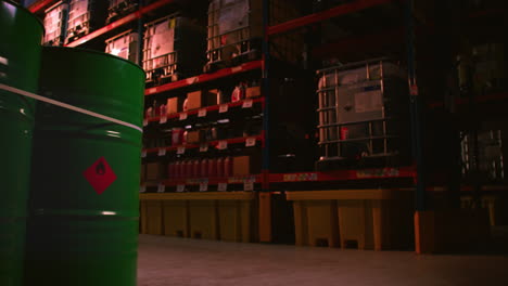 Dark-storage-warehouse-with-dangerous-barrels-with-flammable-liquid