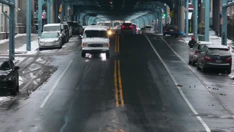 Traffic-and-homelessness-under-Kensington-Avenue-in-Philadelphia,-PA